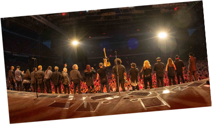 The E Street Band takes a bow on stage during 2023 Tour